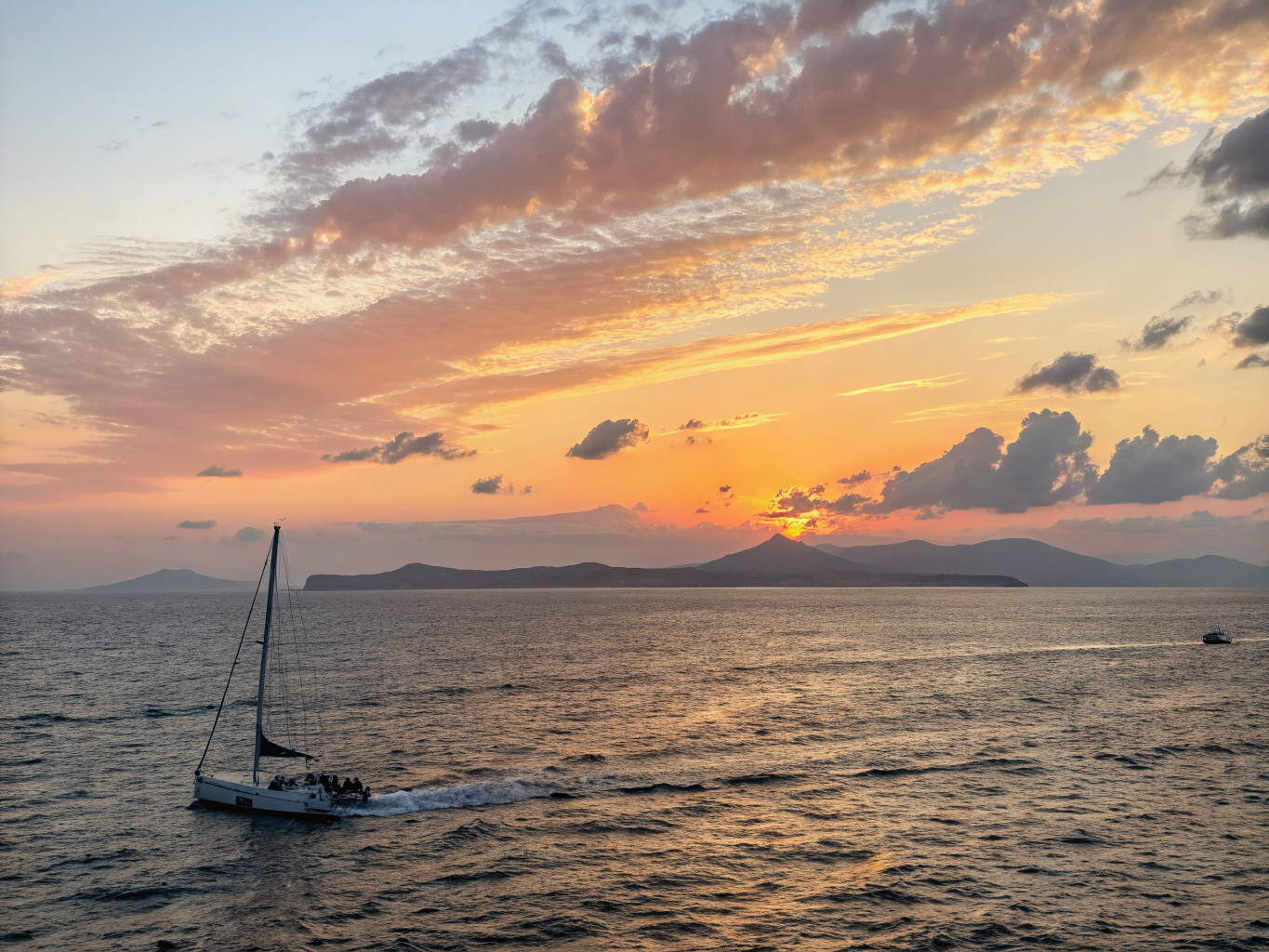 Aegean sea spray hitting the bow under early morning light